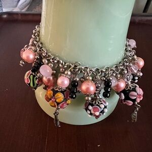 Vintage Charmed pink bracelet cha cha style. Silver tone, faux pearls,
Lamp work